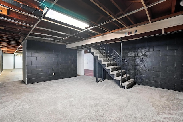 899 Meadowview Dr, Columbus, OH 43224 - finished below grade area featuring stairway and concrete block wall