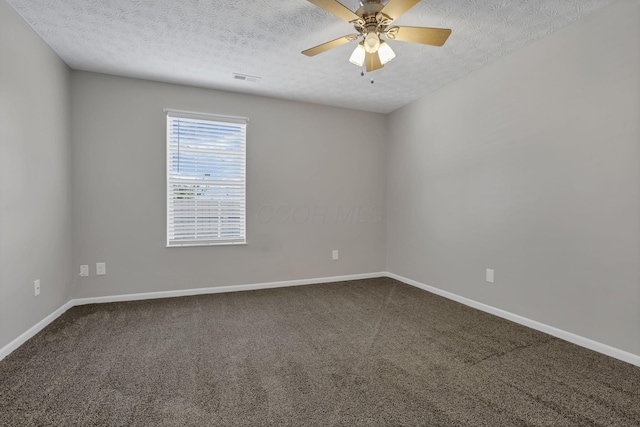 6658 Lagrange Dr Unit 43E, Canal Winchester, OH 43110 - unfurnished room featuring dark carpet, a textured ceiling, and ceiling fan