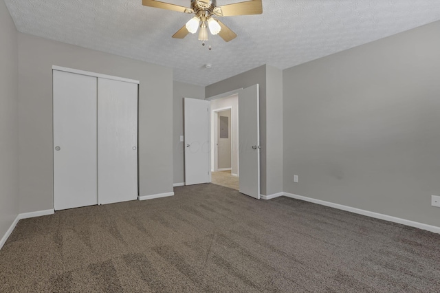 6658 Lagrange Dr Unit 43E, Canal Winchester, OH 43110 - unfurnished bedroom with carpet flooring, a closet, a textured ceiling, and ceiling fan