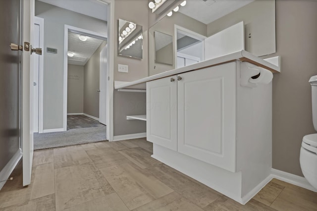 6658 Lagrange Dr Unit 43E, Canal Winchester, OH 43110 - bathroom featuring toilet and baseboards