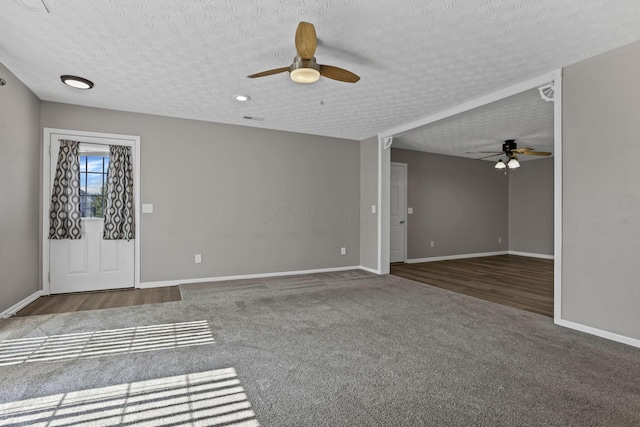 6658 Lagrange Dr Unit 43E, Canal Winchester, OH 43110 - spare room featuring a ceiling fan, carpet, and a textured ceiling