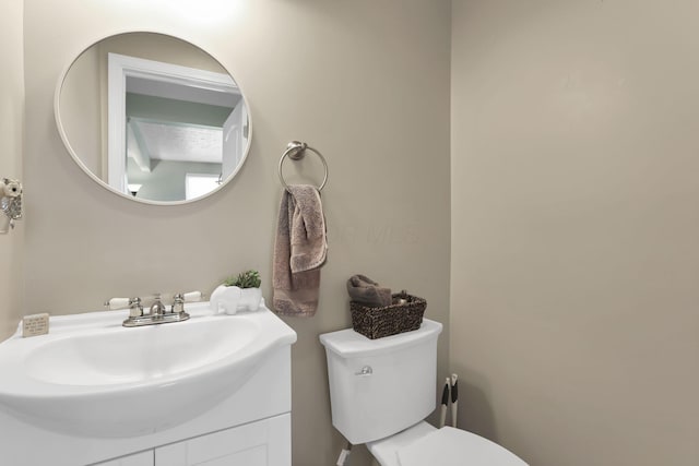 664 Dukewell Pl, Galloway, OH 43119 - half bathroom featuring vanity and toilet