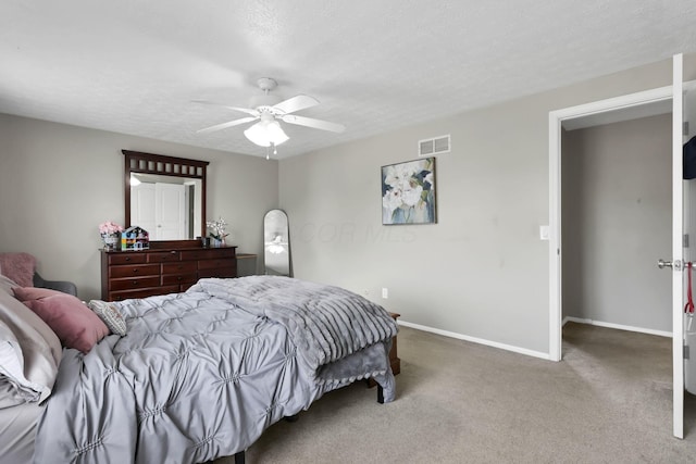664 Dukewell Pl, Galloway, OH 43119 - bedroom featuring carpet floors, ceiling fan, and a textured ceiling