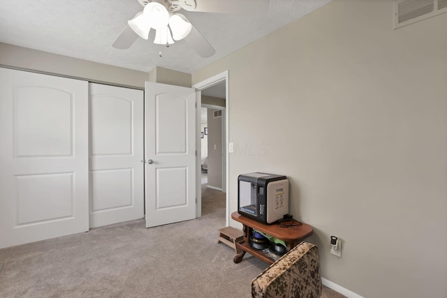 664 Dukewell Pl, Galloway, OH 43119 - bedroom with light colored carpet, a closet, and a ceiling fan
