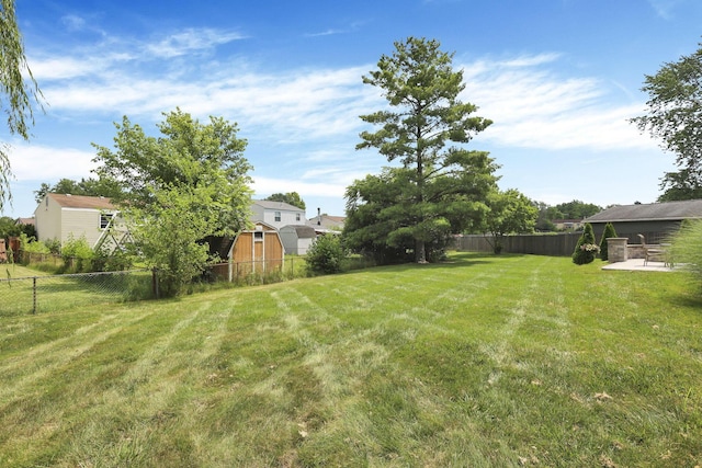 664 Dukewell Pl, Galloway, OH 43119 - fenced backyard featuring a residential view and a patio
