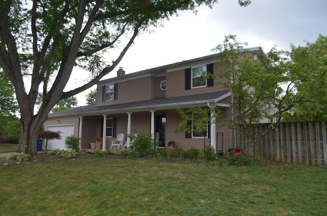 3421 Noreen Dr, Columbus, OH 43221 - view of front of property with a porch, an attached garage, and a chimney
