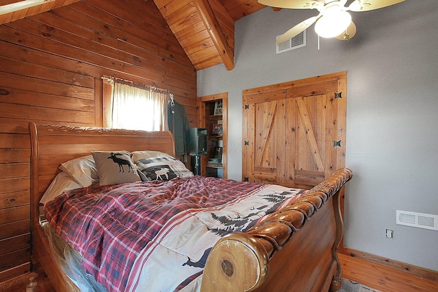 8713 State Route 207, Mount Sterling, OH 43143 - bedroom featuring vaulted ceiling, wooden ceiling, a ceiling fan, and wooden walls