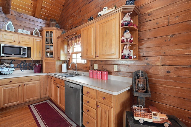 8713 State Route 207, Mount Sterling, OH 43143 - kitchen featuring appliances with stainless steel finishes, wood walls, light countertops, wood ceiling, and light wood finished floors