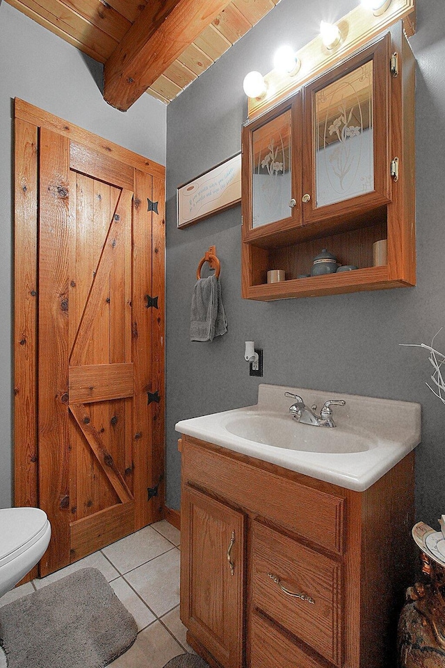 8713 State Route 207, Mount Sterling, OH 43143 - bathroom featuring vanity, tile patterned flooring, and a wood ceiling with exposed beams