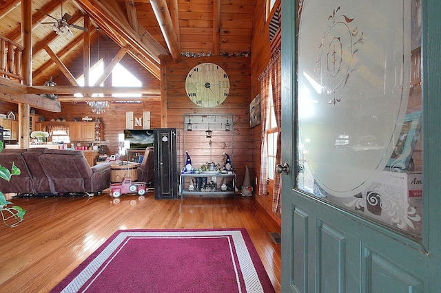 8713 State Route 207, Mount Sterling, OH 43143 - entryway with wood finished floors, wood walls, a wood ceiling with exposed beams, a ceiling fan, and high vaulted ceiling