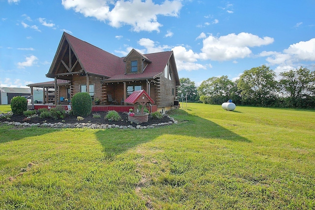 8713 State Route 207, Mount Sterling, OH 43143 - view of side of home with log siding, a yard, and a porch