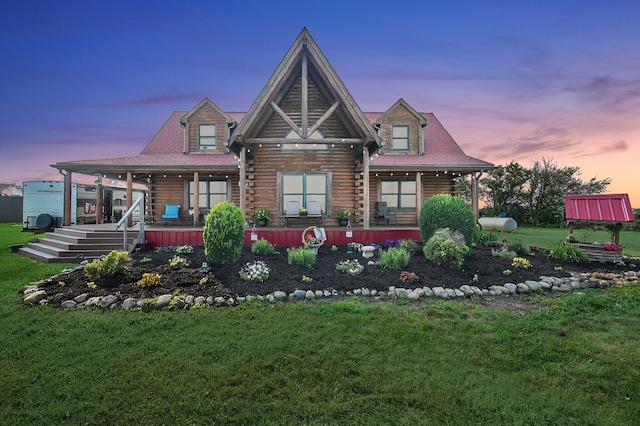 8713 State Route 207, Mount Sterling, OH 43143 - back of house with covered porch, log exterior, and a yard