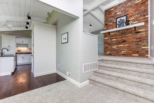 2109 W 5th Ave Unit C, Grandview Heights, OH 43212 - stairs featuring wood-type flooring, track lighting, wooden ceiling, a ceiling fan, and carpet flooring