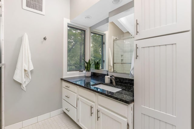 2109 W 5th Ave Unit C, Grandview Heights, OH 43212 - full bathroom with a shower stall, vanity, and tile patterned flooring