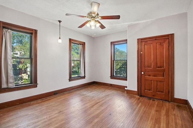 366 Hudson Ave, Newark, OH 43055 - empty room featuring hardwood / wood-style flooring, healthy amount of natural light, and ceiling fan
