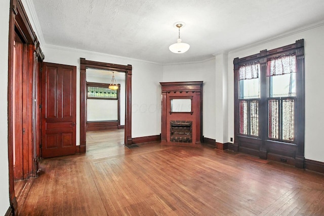 366 Hudson Ave, Newark, OH 43055 - unfurnished living room with wood-type flooring and crown molding