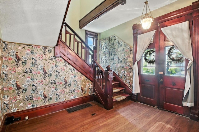 366 Hudson Ave, Newark, OH 43055 - foyer entrance featuring wallpapered walls, stairway, and hardwood / wood-style flooring