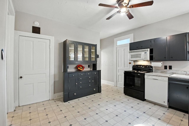 366 Hudson Ave, Newark, OH 43055 - kitchen with white appliances, a ceiling fan, dark cabinetry, glass insert cabinets, and light flooring