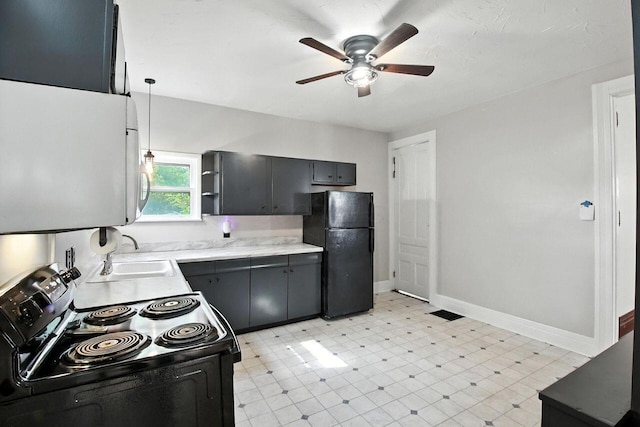 366 Hudson Ave, Newark, OH 43055 - kitchen featuring black appliances, a ceiling fan, light flooring, light countertops, and gray cabinetry