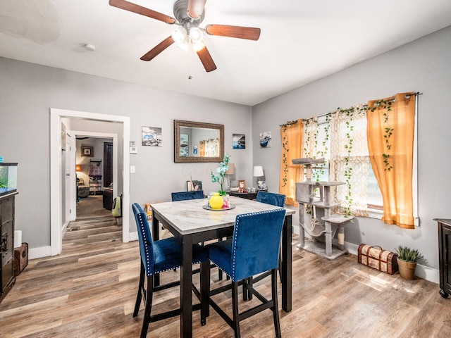 2640-2642 W Broad St, Columbus, OH 43204 - dining room with a ceiling fan and light wood finished floors