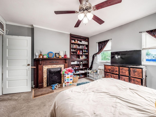 2640-2642 W Broad St, Columbus, OH 43204 - bedroom featuring multiple windows, a fireplace, carpet, ornamental molding, and a ceiling fan