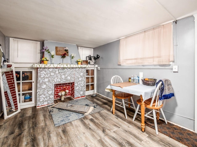 2640-2642 W Broad St, Columbus, OH 43204 - dining area with wood finished floors and a tile fireplace