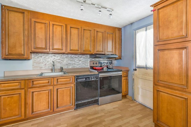 3162 New Year Dr, Cincinnati, OH 45251 - kitchen with black dishwasher, electric range, brown cabinetry, and range hood