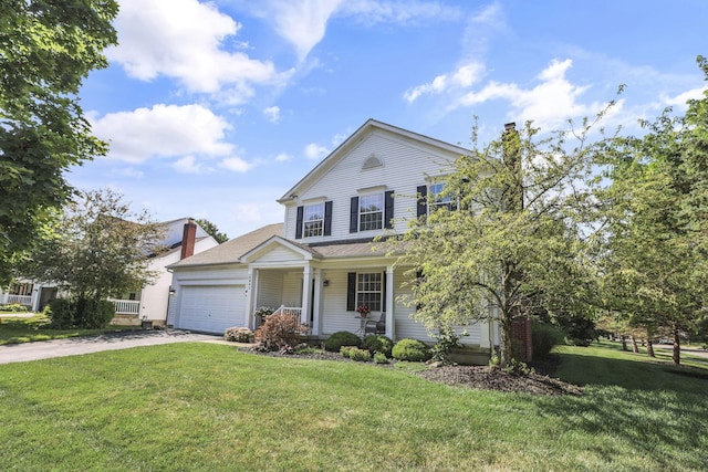 6041 Tetlin Field Dr, New Albany, OH 43054 - traditional-style home featuring driveway, a front lawn, a garage, a porch, and a chimney