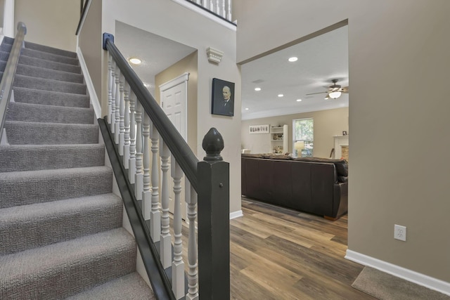 6041 Tetlin Field Dr, New Albany, OH 43054 - staircase featuring ceiling fan, wood finished floors, and recessed lighting