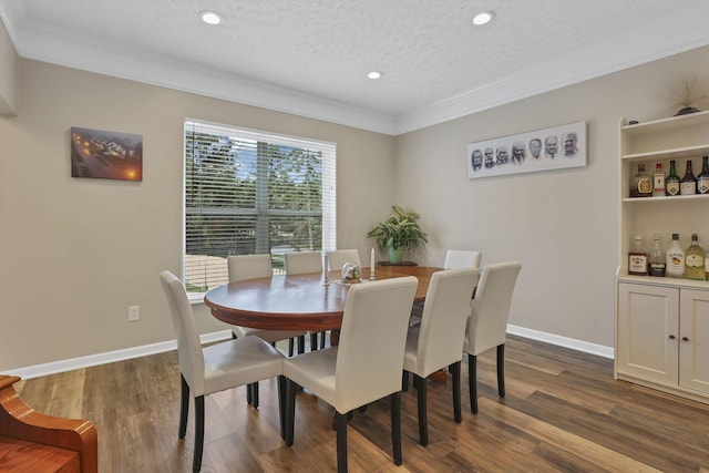 6041 Tetlin Field Dr, New Albany, OH 43054 - dining room featuring crown molding, recessed lighting, dark wood-style flooring, and a textured ceiling