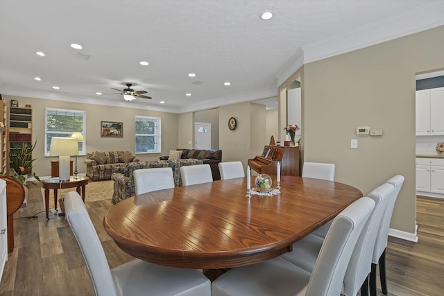 6041 Tetlin Field Dr, New Albany, OH 43054 - dining room featuring dark wood-type flooring, crown molding, recessed lighting, and ceiling fan