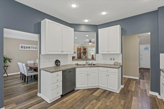 6041 Tetlin Field Dr, New Albany, OH 43054 - kitchen with stainless steel dishwasher, ceiling fan, a textured ceiling, dark wood-style floors, and decorative backsplash