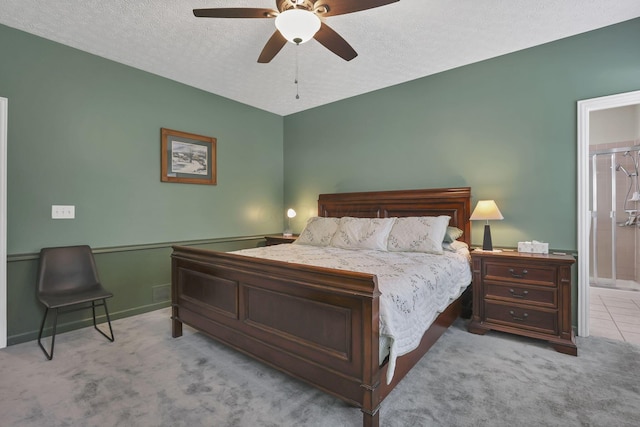 6041 Tetlin Field Dr, New Albany, OH 43054 - bedroom featuring carpet, a textured ceiling, ceiling fan, and connected bathroom