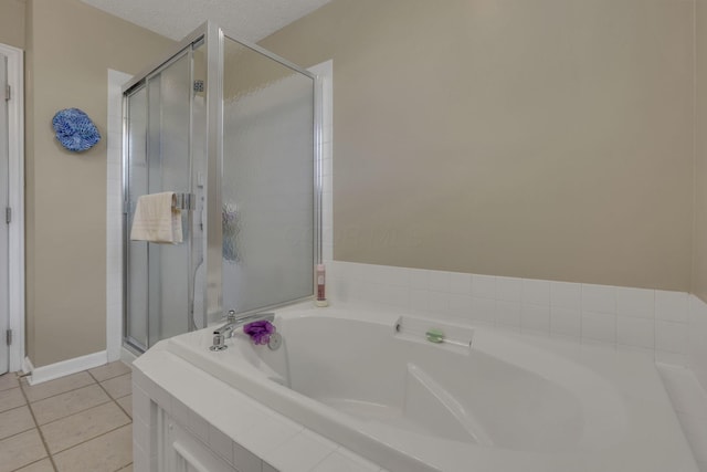6041 Tetlin Field Dr, New Albany, OH 43054 - full bath with tile patterned flooring, a garden tub, and a stall shower