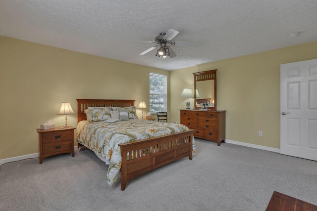 6041 Tetlin Field Dr, New Albany, OH 43054 - bedroom featuring light colored carpet, a textured ceiling, and ceiling fan