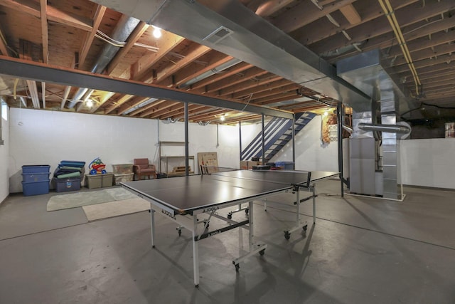6041 Tetlin Field Dr, New Albany, OH 43054 - playroom with concrete floors and heating unit