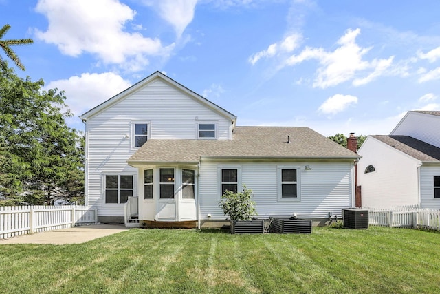 6041 Tetlin Field Dr, New Albany, OH 43054 - rear view of house featuring entry steps, a patio, a fenced backyard, and roof with shingles