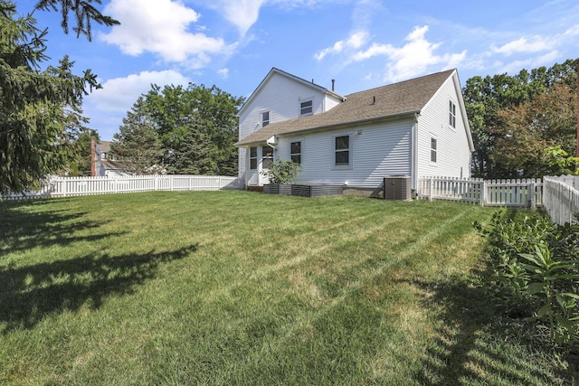 6041 Tetlin Field Dr, New Albany, OH 43054 - rear view of property with entry steps, a fenced backyard, and roof with shingles