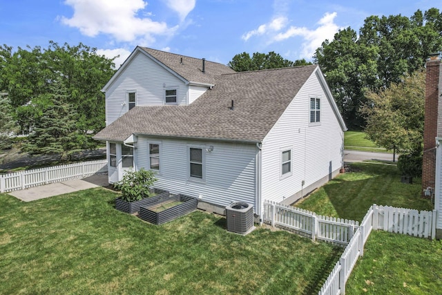 6041 Tetlin Field Dr, New Albany, OH 43054 - rear view of property with a shingled roof and a fenced backyard