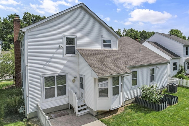 6041 Tetlin Field Dr, New Albany, OH 43054 - rear view of house featuring a shingled roof and a chimney