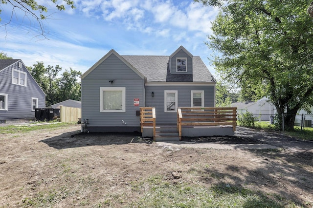 1808 Brentnell Ave, Columbus, OH 43219 - view of front facade with a wooden deck and roof with shingles