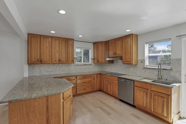 1808 Brentnell Ave, Columbus, OH 43219 - kitchen with dishwasher, under cabinet range hood, black electric stovetop, a peninsula, and light stone counters