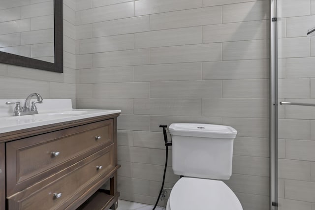 1808 Brentnell Ave, Columbus, OH 43219 - bathroom with vanity and tile walls
