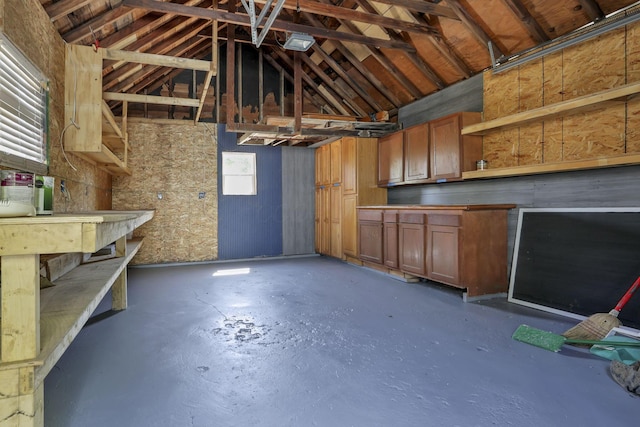 1808 Brentnell Ave, Columbus, OH 43219 - misc room with lofted ceiling and concrete floors