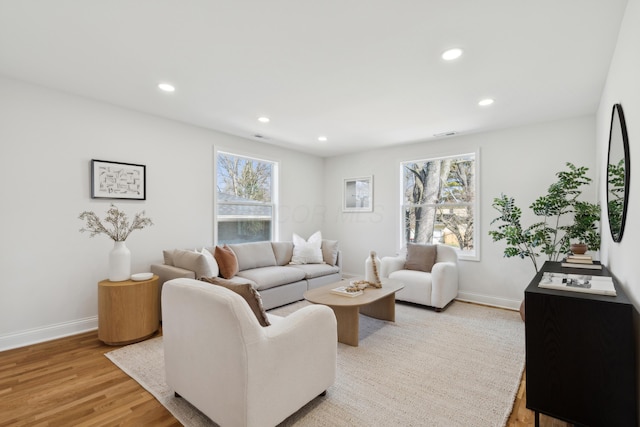 86 W N Broadway, Columbus, OH 43214 - living room with plenty of natural light, wood finished floors, and recessed lighting