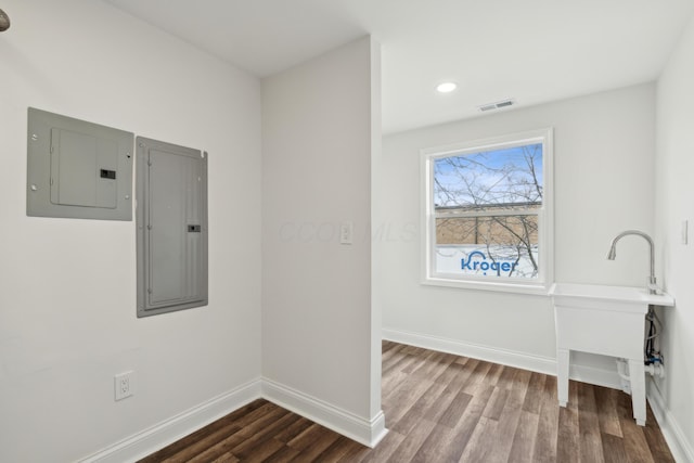 86 W N Broadway, Columbus, OH 43214 - laundry area with electric panel, dark wood finished floors, and recessed lighting