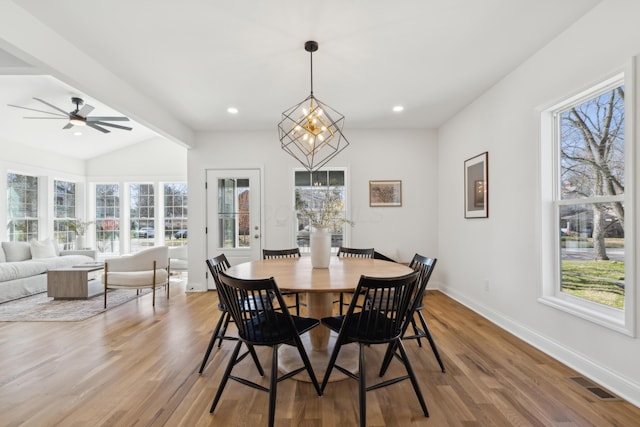 86 W N Broadway, Columbus, OH 43214 - dining area featuring wood finished floors, a chandelier, ceiling fan, and recessed lighting