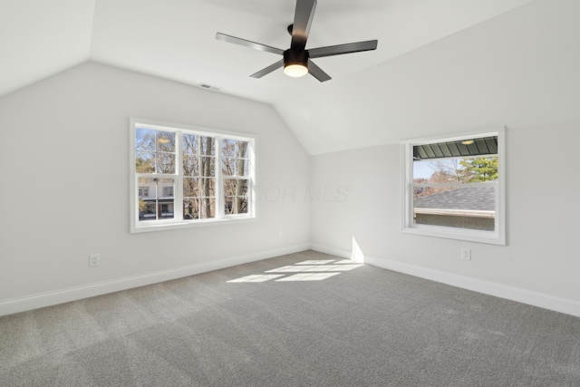 86 W N Broadway, Columbus, OH 43214 - additional living space with lofted ceiling, plenty of natural light, a ceiling fan, and carpet floors