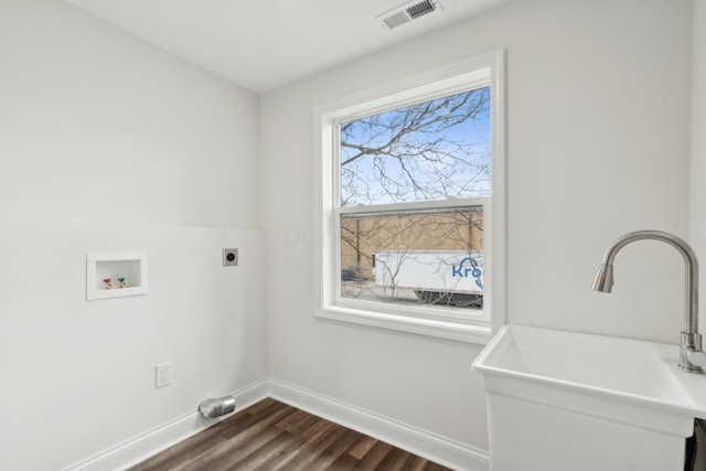 86 W N Broadway, Columbus, OH 43214 - laundry area with dark wood finished floors, hookup for an electric dryer, and washer hookup