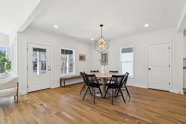 86 W N Broadway, Columbus, OH 43214 - dining area with light wood-style floors, a chandelier, and recessed lighting